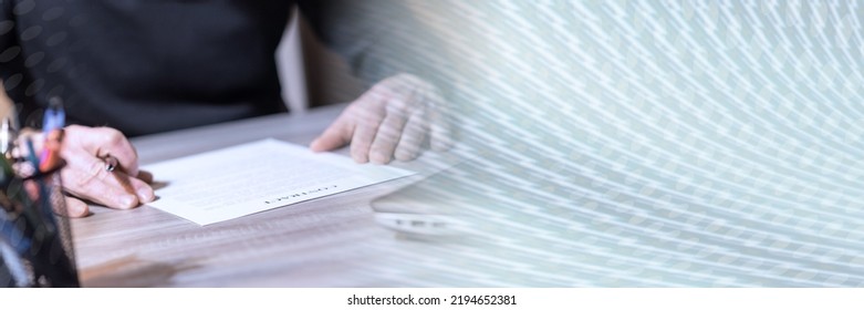 Businessman reviewing terms of contract at office; panoramic banner - Shutterstock ID 2194652381