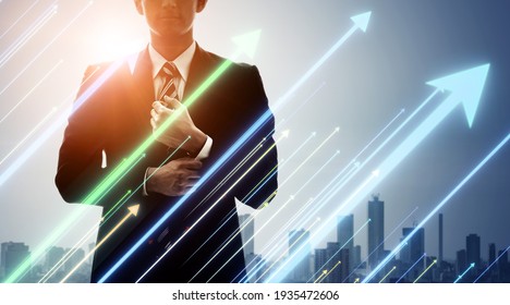 Businessman and rising arrow symbols. Career development. Growth. Success. - Shutterstock ID 1935472606