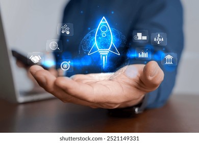 Businessman and rocket start flying up and network line connection. Startup concept strategy launch Startup growth, plan development business project digital technology idea of leadership - Powered by Shutterstock