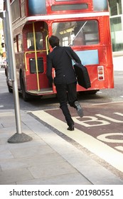 Businessman Running For Bus