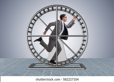 Businessman Running On Hamster Wheel