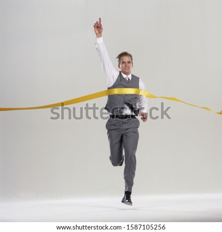 Similar – Image, Stock Photo runner running across the field with his dog