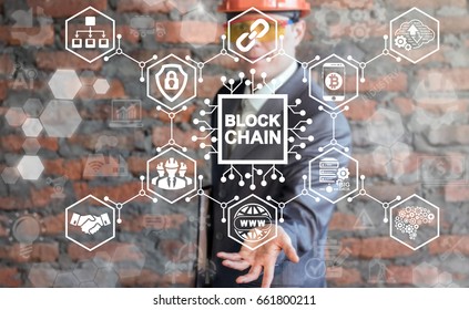 Businessman in safety helmet and glass offers blockchain microchip (circuit) icon on virtual screen. Blockchain Industrial Big Data Strategy Concept. Block Chain Industry 4.0 Technology. - Shutterstock ID 661800211