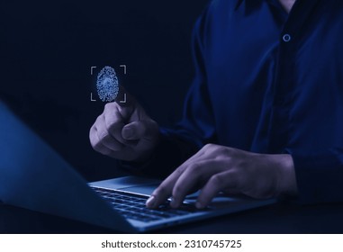 Businessman scanning fingerprint and biometric authentication, cyber security and fingerprint password. - Shutterstock ID 2310745725