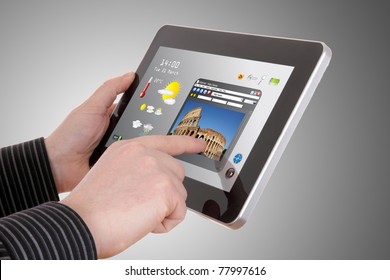 businessman searching a tourism information on pad - Powered by Shutterstock