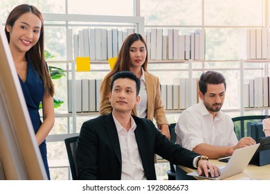 businessman and secretary with team business working together using laptop computer at modern office, Lifestyle business work at home concept.
