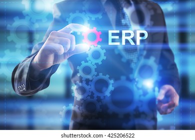 Businessman Is Selecting ERP On The Virtual Screen.