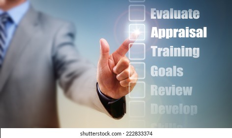 Businessman selecting self improvement options for appraisal, goals and training