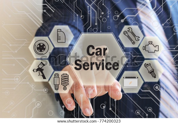 The businessman selects a car
service on the touch screen with a futuristic background.
