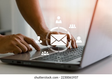 Businessman sending email by laptop. Online people network. Using the internet for communication. Email marketing, data center and internet advertising concept. send e-mail or newsletter to customers. - Shutterstock ID 2230061937