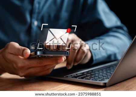 Businessman sending email by laptop computer to customer, business contact and communication, email icon, email marketing concept, send e-mail or newsletter, online working internet network.