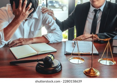 Businessman shaking hands to seal a deal Judges male lawyers Consultation legal services Consulting in regard to the various contracts to plan the case in court. - Shutterstock ID 2280158639