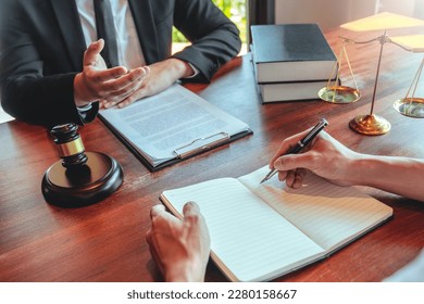 Businessman shaking hands to seal a deal Judges male lawyers Consultation legal services Consulting in regard to the various contracts to plan the case in court. - Shutterstock ID 2280158667