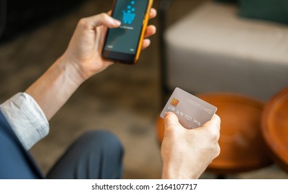 Businessman Shopping Online On Mobile Phone, Payment By Credit Card, Wear Suit, Sitting In Hotel Cafe, Focus Credit Card. Young Man And Woman Work Business Or Shopping Online In Hotel Cafe