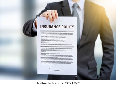 Businessman Show Insurance Policy