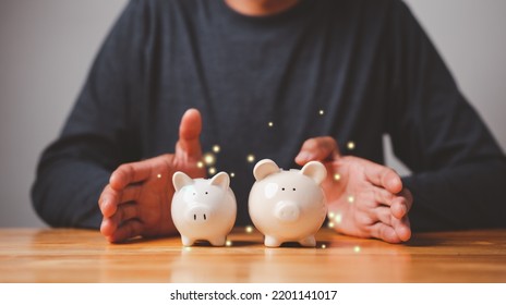 Businessman Show The Piggybank On Table, Donation, Saving, Charity, Family Finance Plan Concept, Fundraising, Superannuation, Investment, Financial Crisis. Family Saving Concept.