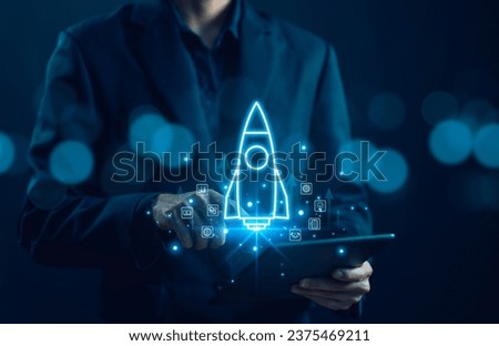 Businessman show rocket start flying up and network line connection. concept of Startup plan development business project digital technology idea of leadership, strategy launch Startup growth