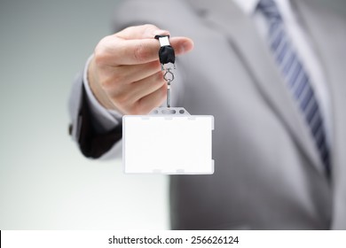 Businessman Showing A Blank Identity Name Card On A Lanyard