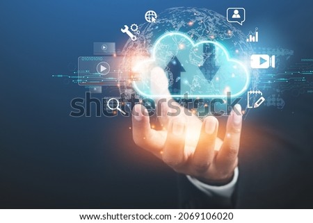 Businessman showing the future world of cloud storage. global internet connection technology
