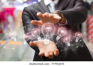 Businessman showing idea network on blurred background. - Shutterstock ID 777952075