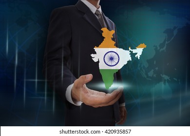 Businessman showing map of India on globe background
