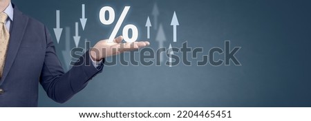 businessman showing percentage sign. hand holding percent symbol. Entrepreneur or client holding percentage sign on blue background. Business, finance, mortgage rates, value added tax, or discount