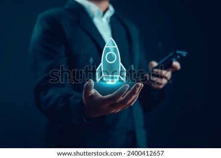 businessman showing Startup business concept Network connection icons on modern virtual interface rocket, idea, growth, digital, technology, concept, unicorn, company, future, success, global,
