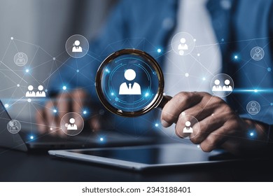 Businessman showing virtual graphic human icon HR human resources recruitment team Staff management business concept.