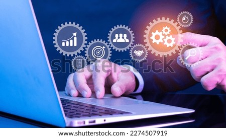 Businessman showing virtual screen of gear cog icon present operation management involving business process, workflow, problem solving, high performance, monitoring and evaluation, quality control.