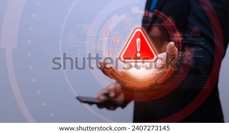 businessman showing warning icon, exclamation mark,alarm,computer virus detected,danger warning concept or information error that should be urgently fixed and repaired,Notification of security issues