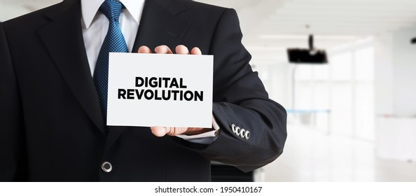 Businessman Shows A Business Card With The Message Digital Revolution. Digital Revolution In Business Industry Concept.


