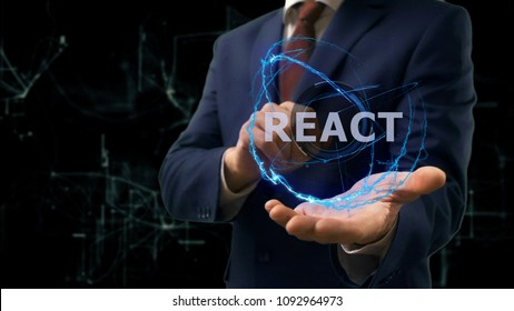 Businessman Shows Concept Hologram React On His Hand. Man In Business Suit With Future Technology Screen And Modern Cosmic Background