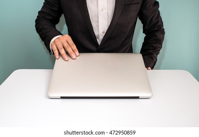 Businessman Shut Down Laptop