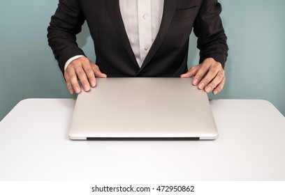 Businessman Shut Down Laptop