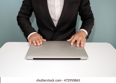 Businessman Shut Down Laptop