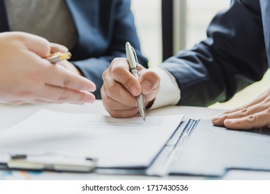 Businessman Sign The Contract, The Agreement In The Document.