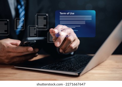 Businessman Sign Terms of use concept, reading terms and conditions of website or service before clicking button agree. Terms and conditions of contract - Shutterstock ID 2271667647