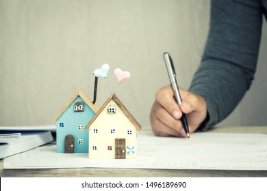 Businessman Signature In Documents Graph Chart Checking Document In Property Investment Project On Desk Office. Report Selling In Mortgage Agent Marketing In Real Estate Concept. Home Driftwood Ideas