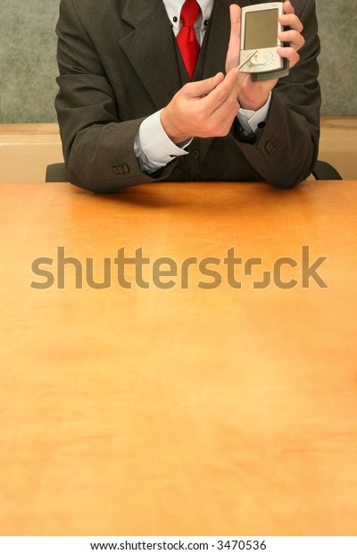 Businessman Sitting Desk Showing His Pda Stock Image Download Now