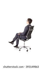 Businessman Sitting On Chair. Side View. Isolated. Concept Of Work.