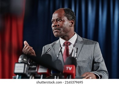 Businessman speaking an interview for television - Powered by Shutterstock