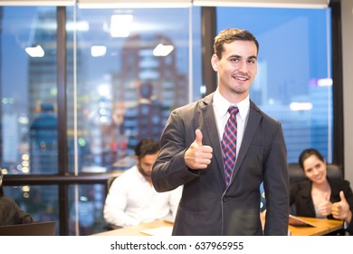 Businessman Stading With Team While Meeting, Businessman Leader Concept, 20-30 Year Old.