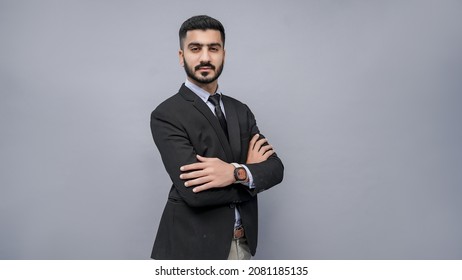 Businessman Standing With Folded Hand In Black Suit Indian Pakistani Model