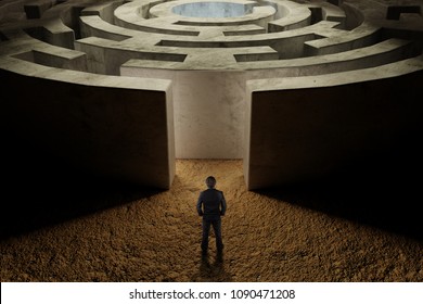 Businessman Standing In Front Of Entrance Of Labyrinth,business Strategy Concept.Business Man Thinking How To Solve This Problem.Business Obstacle,financial,business Growth Concept.