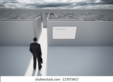 Businessman standing in front of the entrance to the maze. Make a decision. Achieving the goal. With the sign 