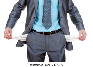 Businessman Standing Isolated On The White Background And Showing His Empty Pocket, Turning His Pocket Inside Out, No Money