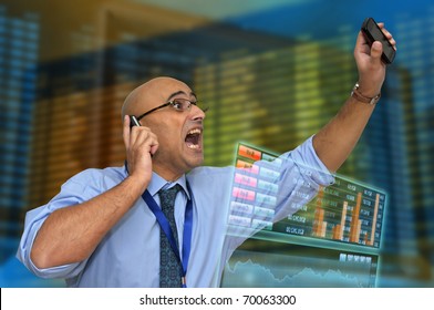 Businessman Or Stock Broker With Cellphone