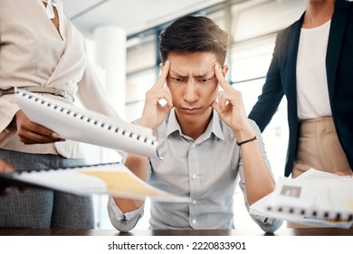 Businessman, Stress And Overwhelmed With Headache, Burnout Or Workload From Colleagues At The Office. Corporate Man Multi Tasking Suffering From Mental Health Issues, Overworked Or Tired At Workplace