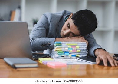 Businessman stressed from overwork and missed deadlines. - Powered by Shutterstock