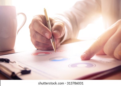 Businessman study financial report. Concept for business, finance, market research, analytics and statistics, marketing. - Shutterstock ID 313786031